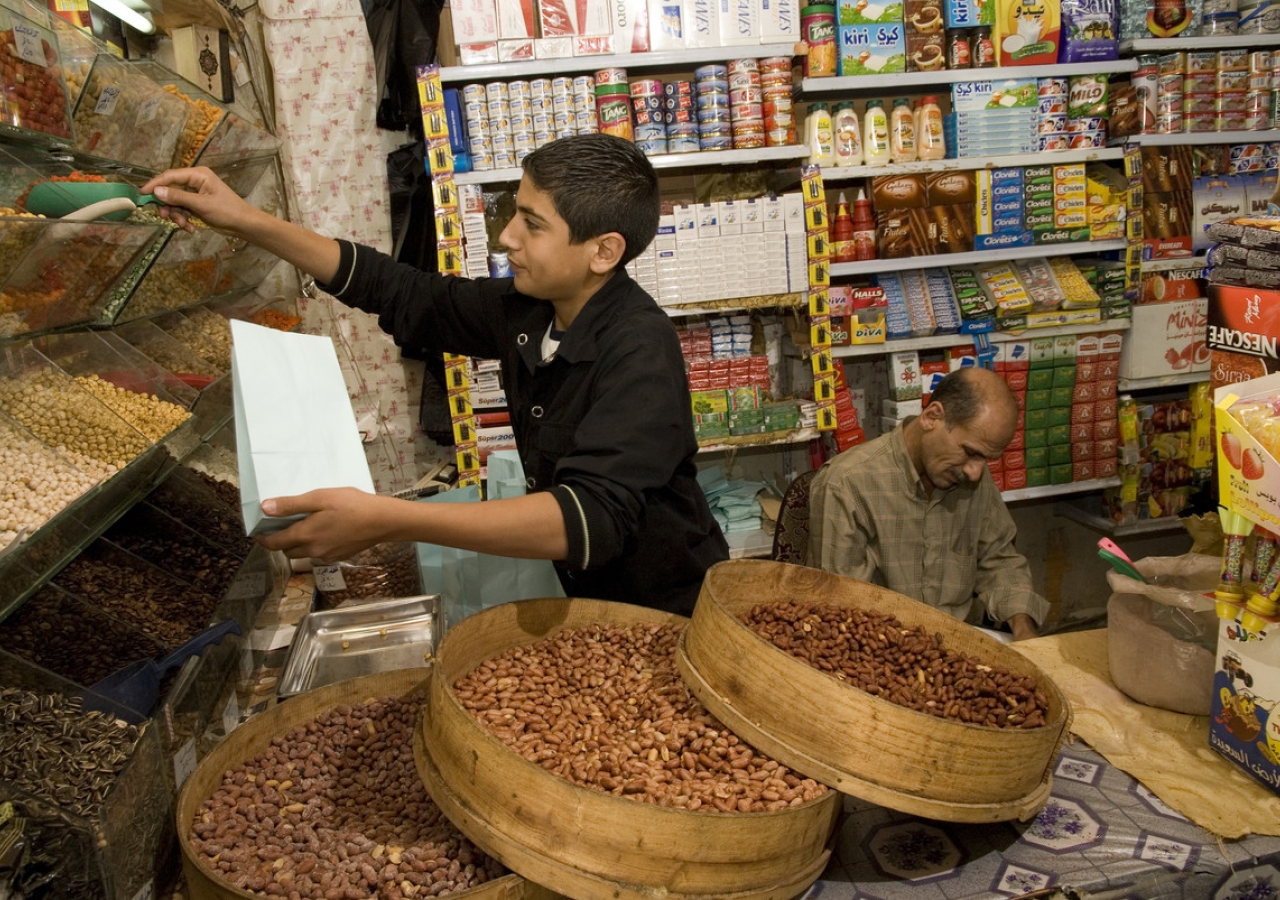 Tamam Al Khoujey took out two Aga Khan Agency for Microfinance loans to expand his shop in Masyaf, Syria. As a result, his monthly net income has nearly doubled.