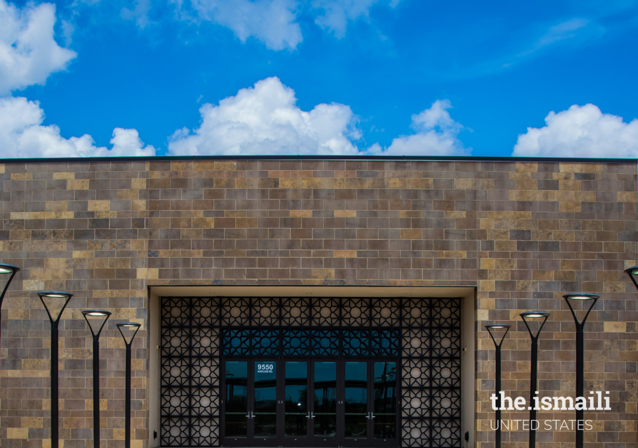 The main entrance of the Harvest Green Ismaili Jamatkhana is built with locally-sourced limestone walls.