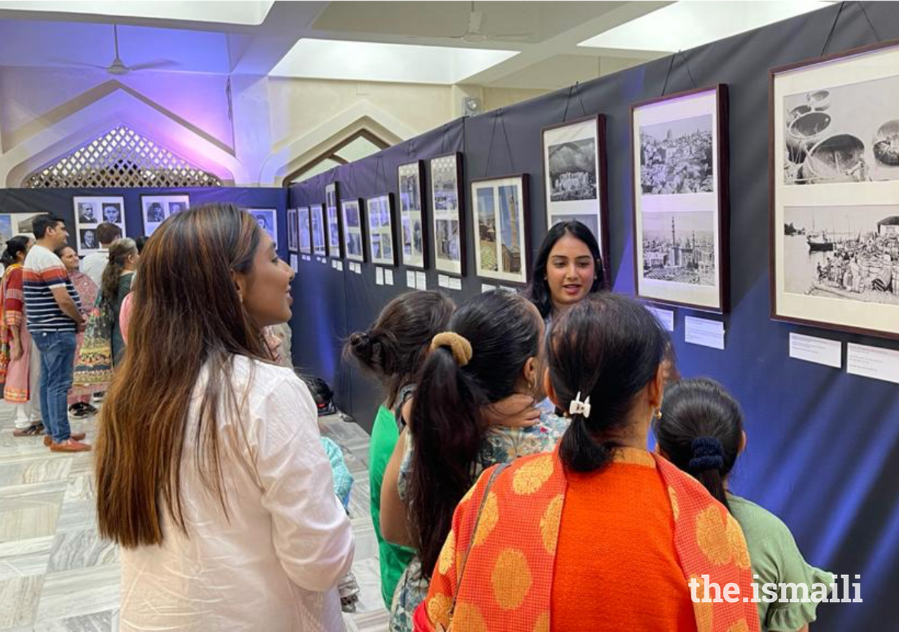 IIS graduates and ITREB staff served as guides for visitors to the exhibition.