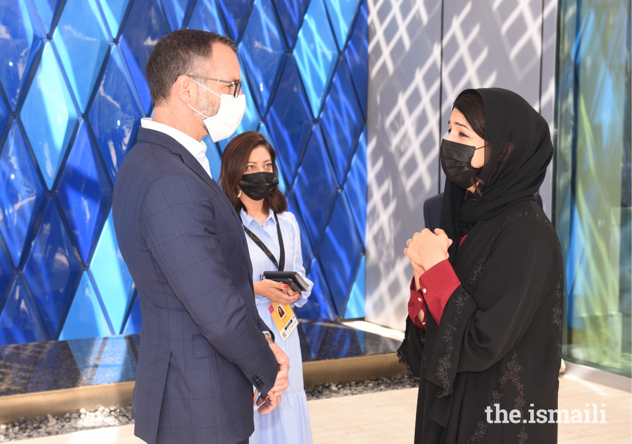 Prince Rahim in conversation with Her Excellency Reem Ebrahim Al Hashimy, the UAE's Minister of State for International Cooperation, at Expo 2020 in Dubai.