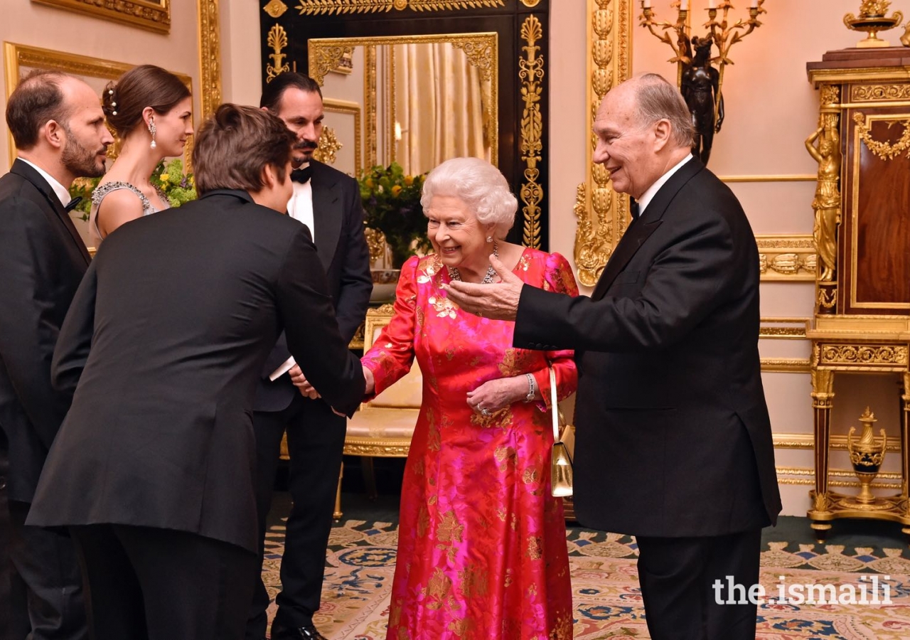 Mawlana Hazar Imam introduces Her Majesty the Queen to members of his family including Prince Rahim, Princess Salwa, Prince Hussain and Prince Aly Muhammad.