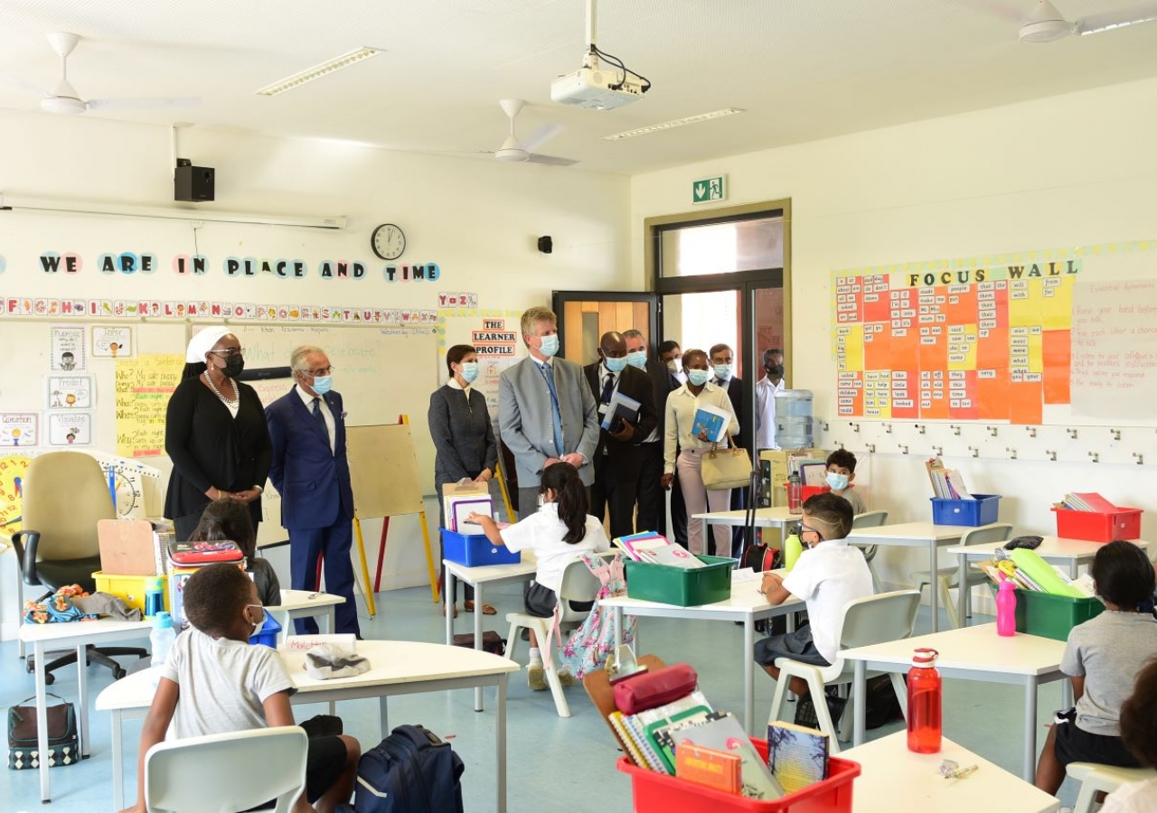 Minister of Education and Human Development Rita Carmelita Namashulua visiting a class at the Aga Khan Academy, accompanied by the Diplomatic Representative of the Aga Khan Development Network Nazim Ahmad and the Director of the Academy Michael Spencer.