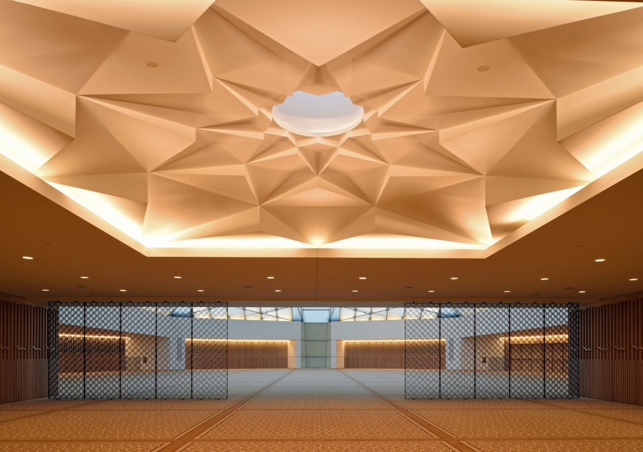 Ismaili Centre Toronto - The “Muqarnas” is a finely crafted corbelled ceiling whose skylight provides a subtle transition from the outside to the serene Jamatkhana inside