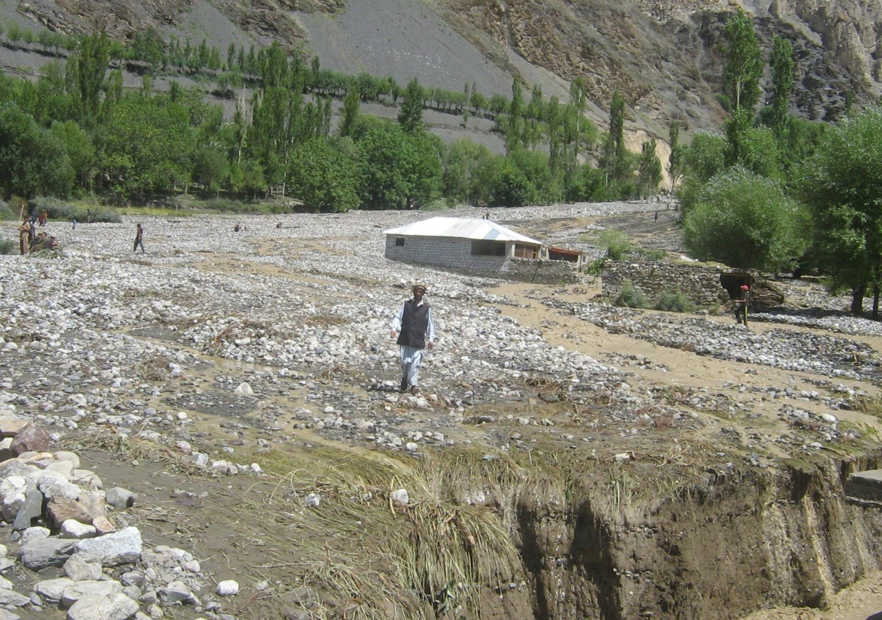 Residents of Yasin were forced to flee as floodwater destroyed their homes, leaving bare land littered with stones and boulders.