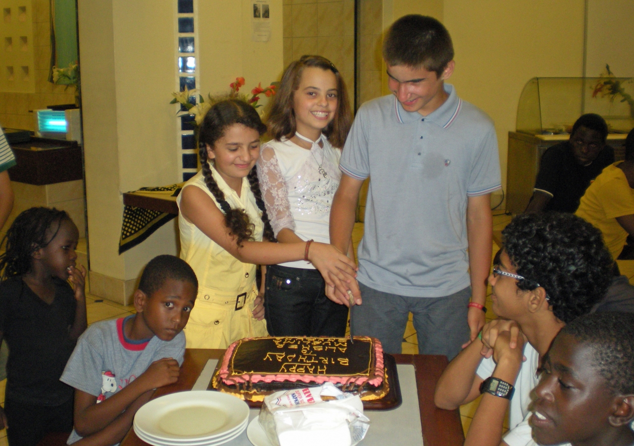 Three of the students celebrate their birthdays with fellow Aga Khan Academy residents.