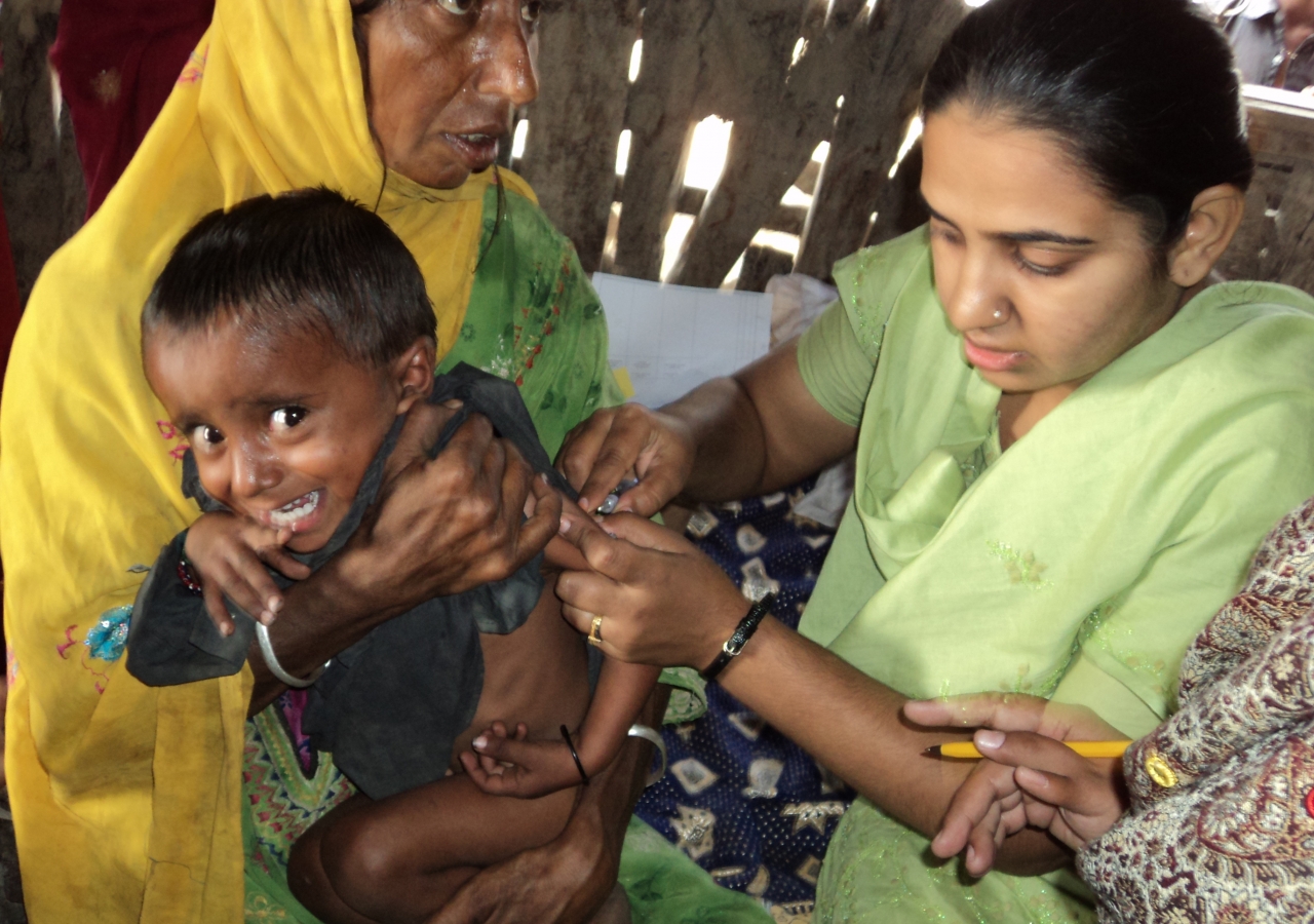 A child is treated at a mobile health clinic run by the Aga Khan Health Service, Pakistan in Sindh.