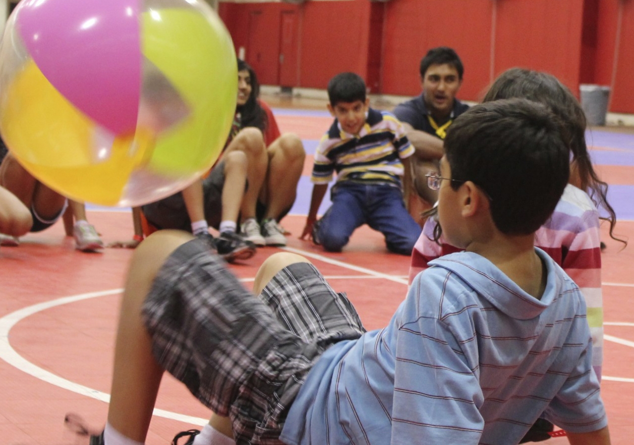 Summer campers playing “Crab Soccer” together!