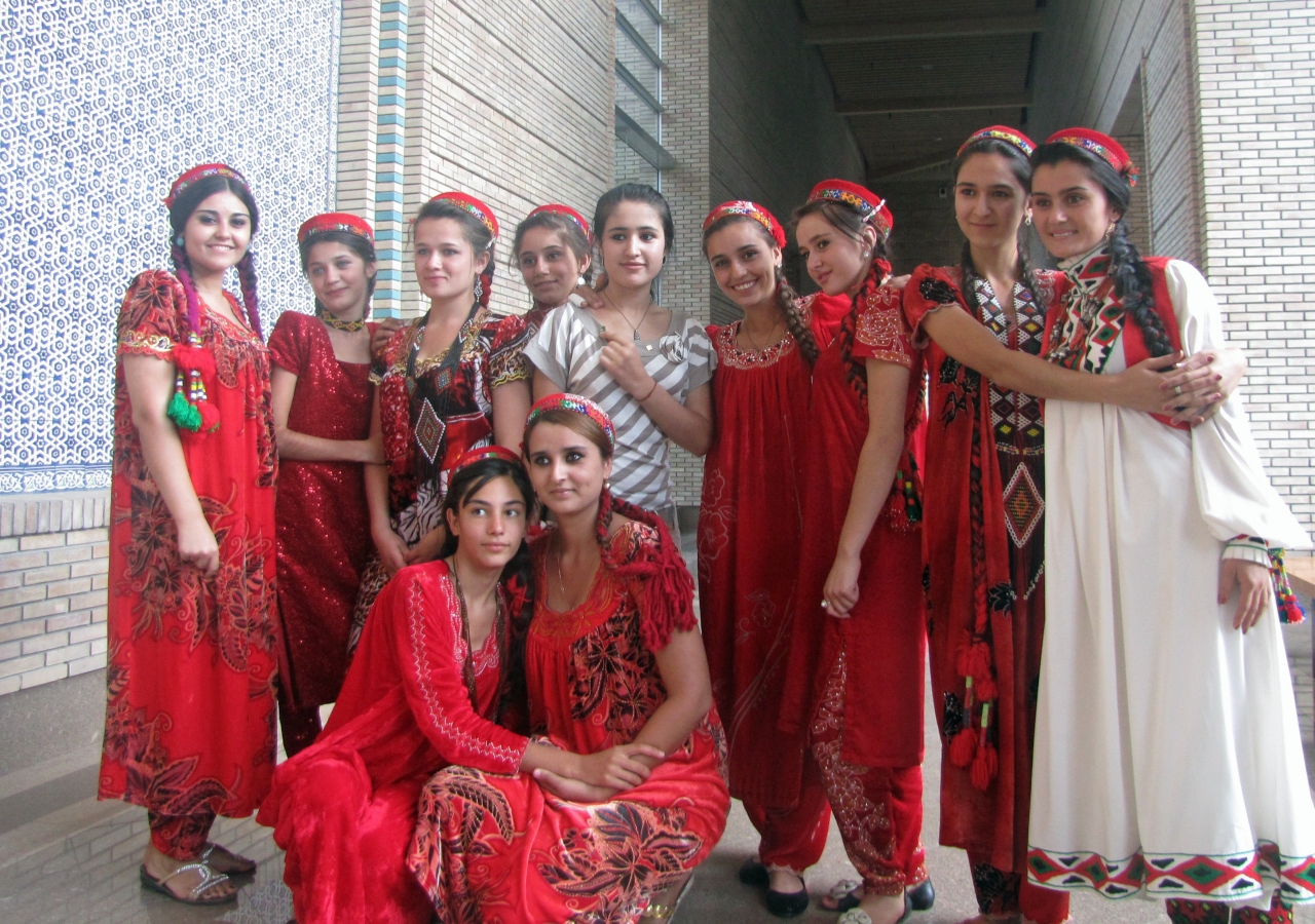 A group of volunteers dressed in traditional Tajik outfits gather for an Eid photograph at the Ismaili Centre, Dushanbe.