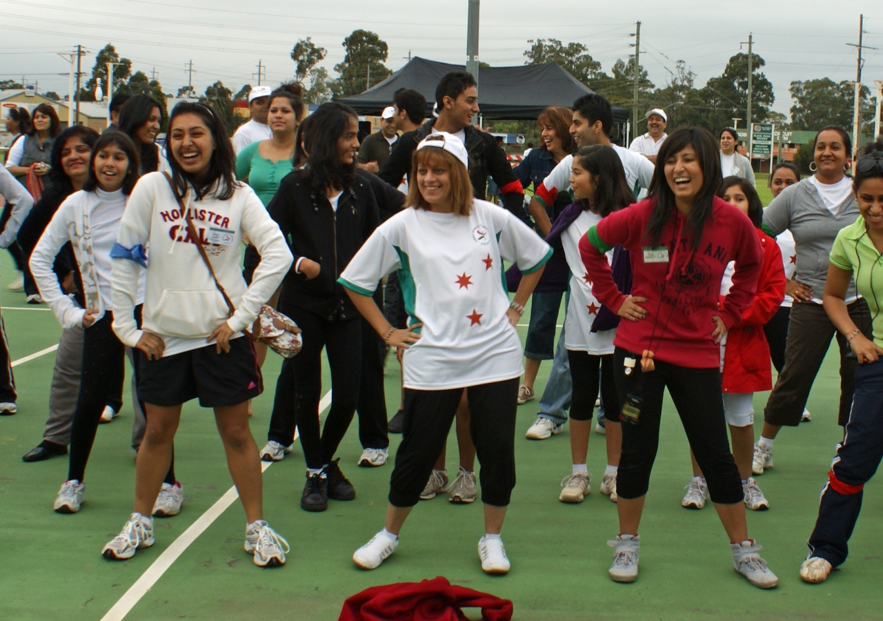 Members of the Jamat enjoy taking part in warm-up exercises at the 2011 National Ismaili Sports Tournament, held in Sydney, Australia.