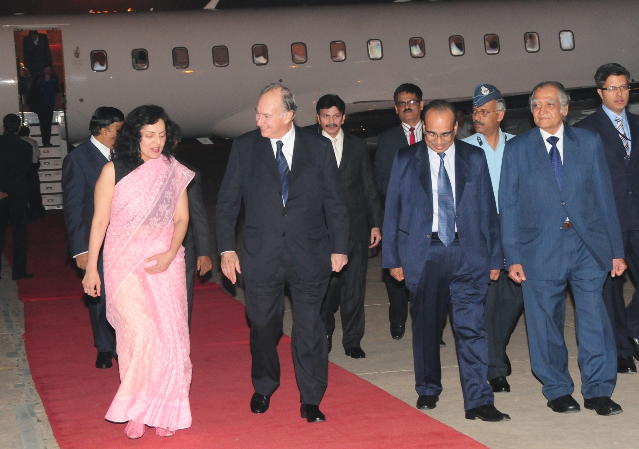 Arriving in Delhi, Mawlana Hazar Imam is welcomed by Ruchira Kamboj, Chief of Protocol for the Government of India, as well as Aitmadi Gulam Rahimtoola, President of the Ismaili Council for India and Abad Ahmed, Chairman of the Aga Khan Foundation in Indi