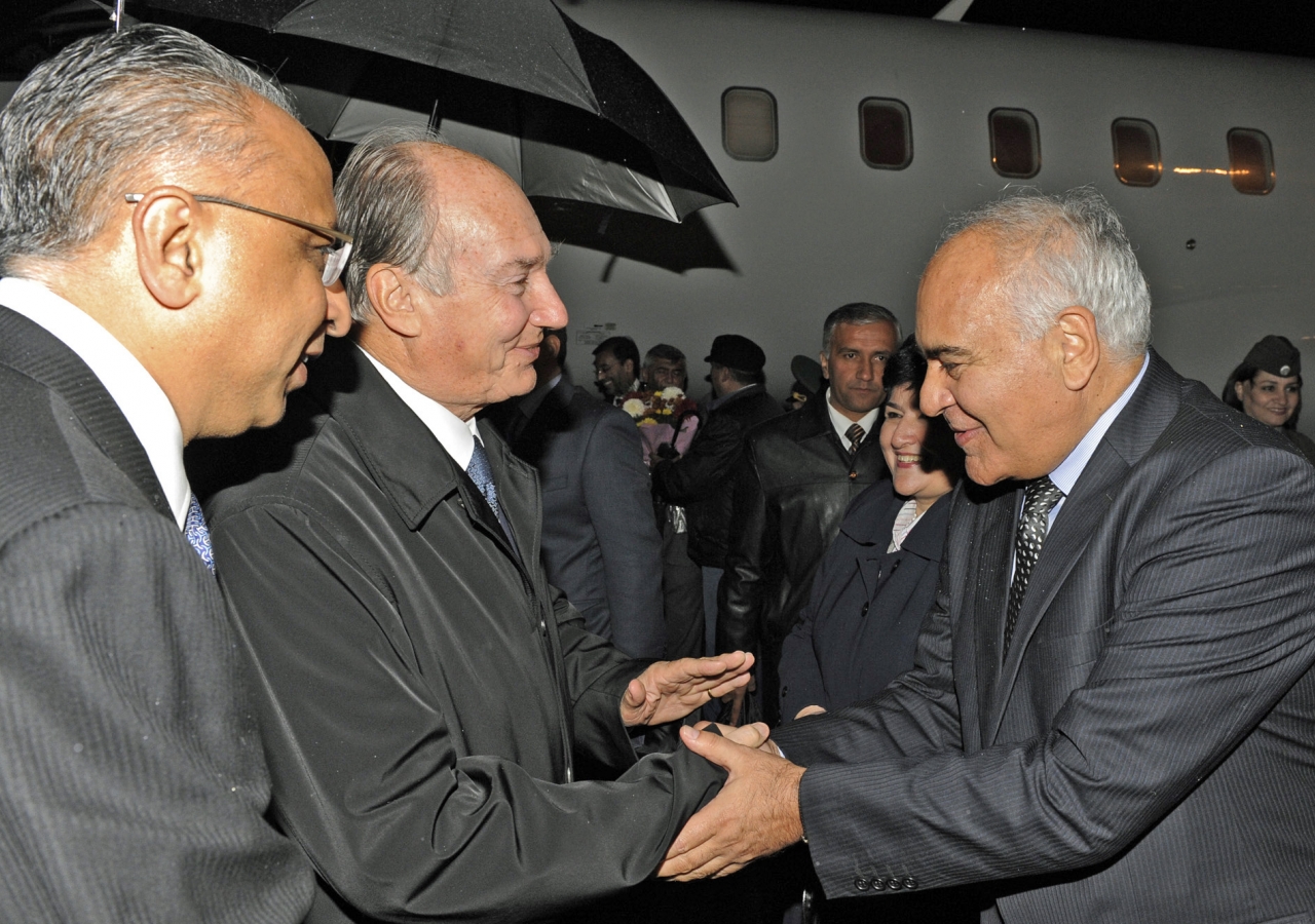 Mawlana Hazar Imam is welcomed to Tajikistan by LIF Member Dr Sharofat Mamadambarova and ITREC Chairman Dr Mamadsho Ilolov, as AKDN Resident Representative Munir Merali looks on.