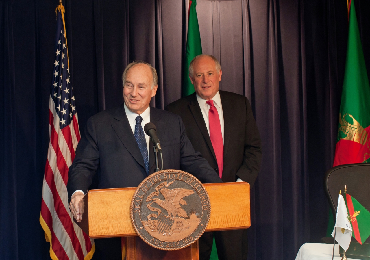 Standing with Illinois Governor Pat Quinn, Mawlana Hazar Imam speaks at the signing of an Agreement of Cooperation between the State of Illinois and the Ismaili Imamat on 4 November 2011.