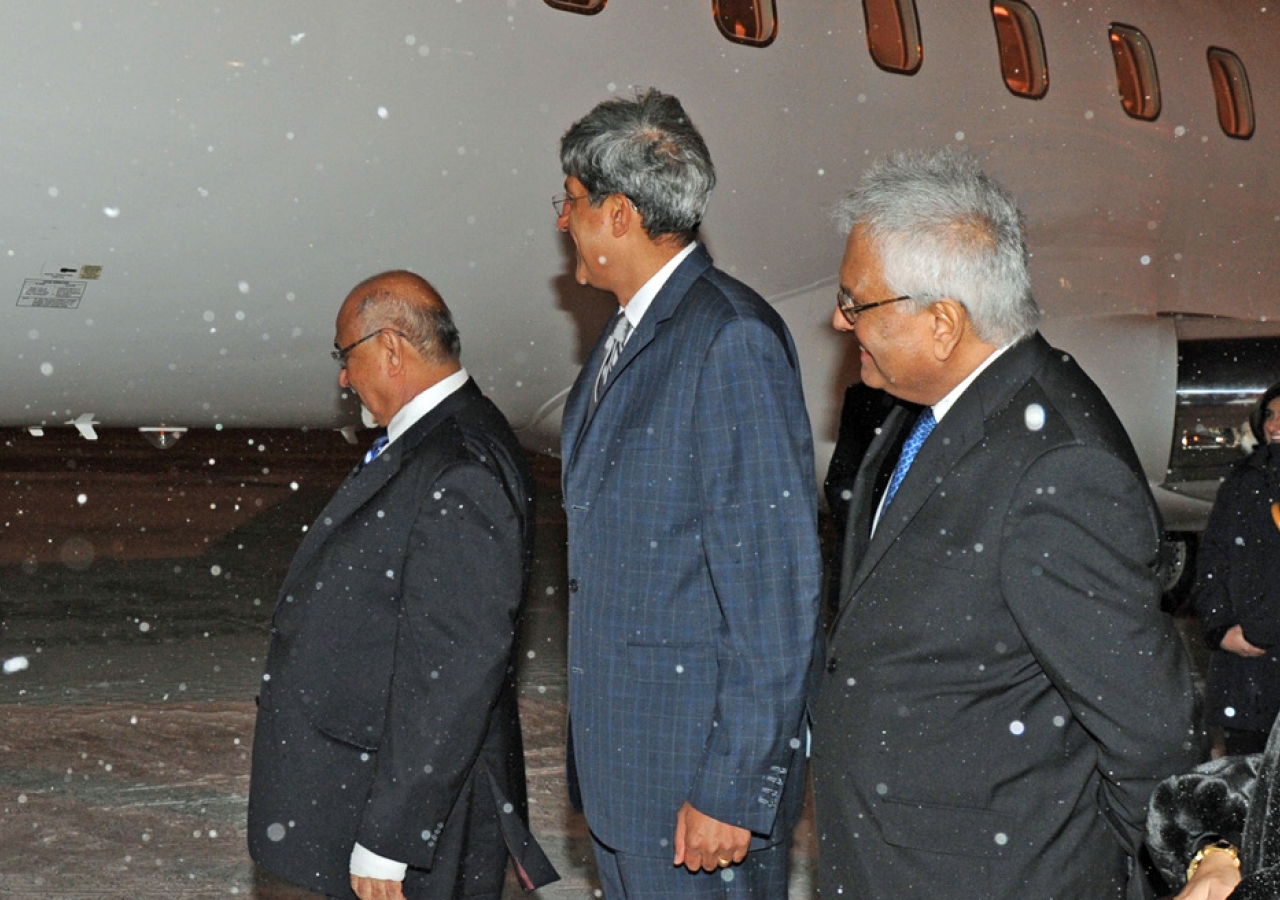 Upon his arrival in Ottawa, Mawlana Hazar Imam is greeted on the snowy tarmac by Ismaili Council for Canada President Mohamed Manji, Vice-President Malik Talib, AKFC Chairman Amin Lalji, and Ismaili Council for Ottawa President Zaina Sovani.