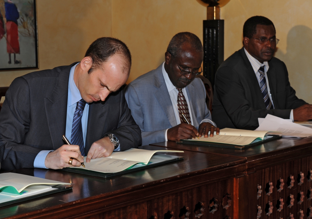 Prince Hussain, Professor Karega Mutahi, and Dr Jacob Ole Miaron PhD, sign a memorandum of understanding for the restoration and rehabilitation of Nairobi's City Park.