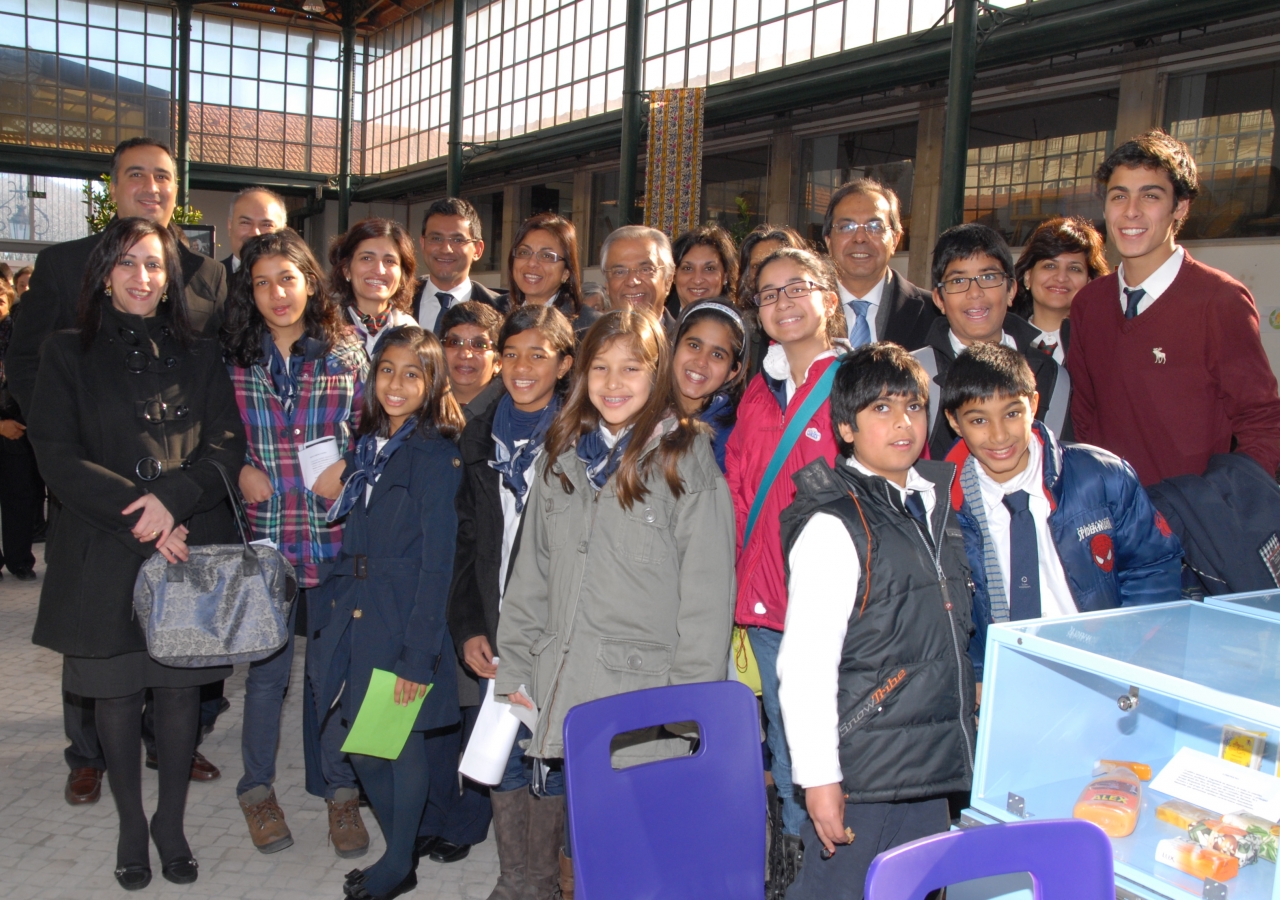 Ismaili Council for Portugal President Amirali Bhanji and AKDN Resident Representative Nazim Ahmad with Ismaili students and volunteers at the World Interfaith Harmony event.