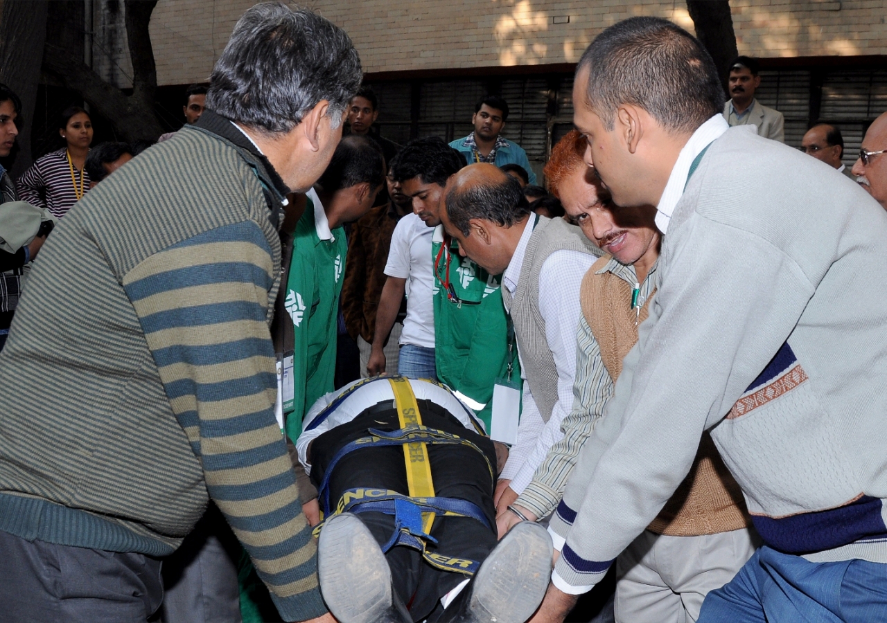 Participants rescue a casualty in a mock drill organised by FOCUS as part of the Delhi Emergency Management Exercise.