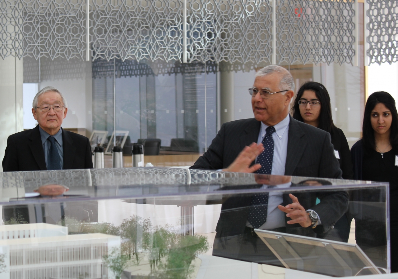 Allaudin Bhanji, a volunteer project manager during the construction of the Delegation, points out details of the building&#039;s design, as Ted Teshima looks on.