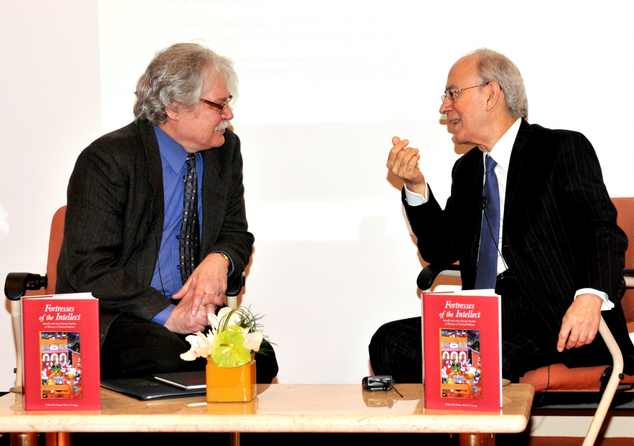 Dr Farhad Daftary (right) and Dr Derryl MacLean engage in an on-stage conversation as part of the launch of the publication "Fortresses of the Intellect" at the Ismaili Centre, Burnaby.