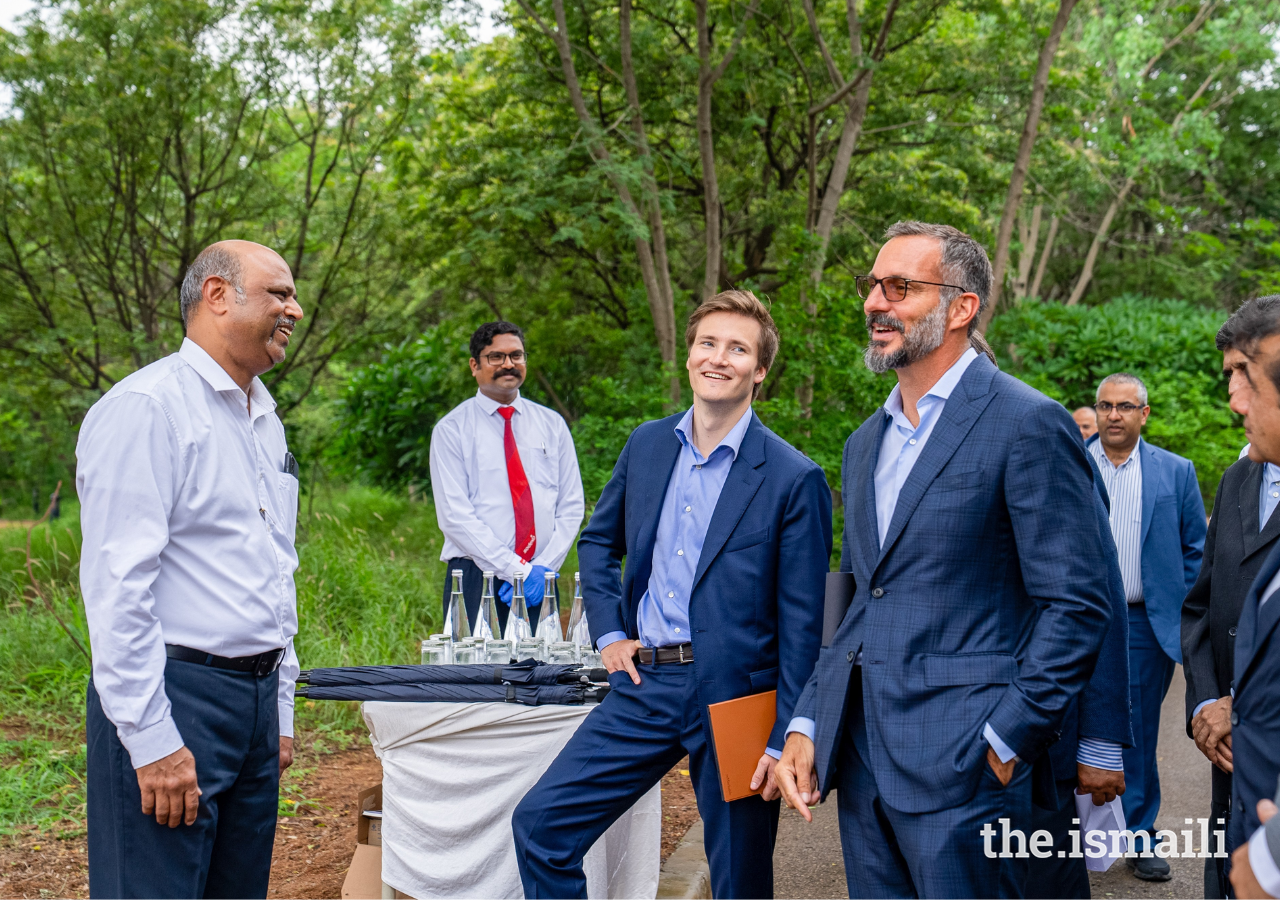 Prince Rahim and Prince Aly Muhammad share a light moment with staff members at the Aga Khan Academy Hyderabad.