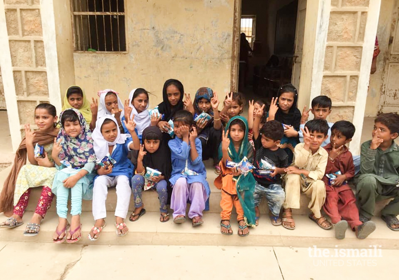 Children of Jungshahi celebrate Pakistan Independence Day by attending a special session led by KWA youth volunteers.