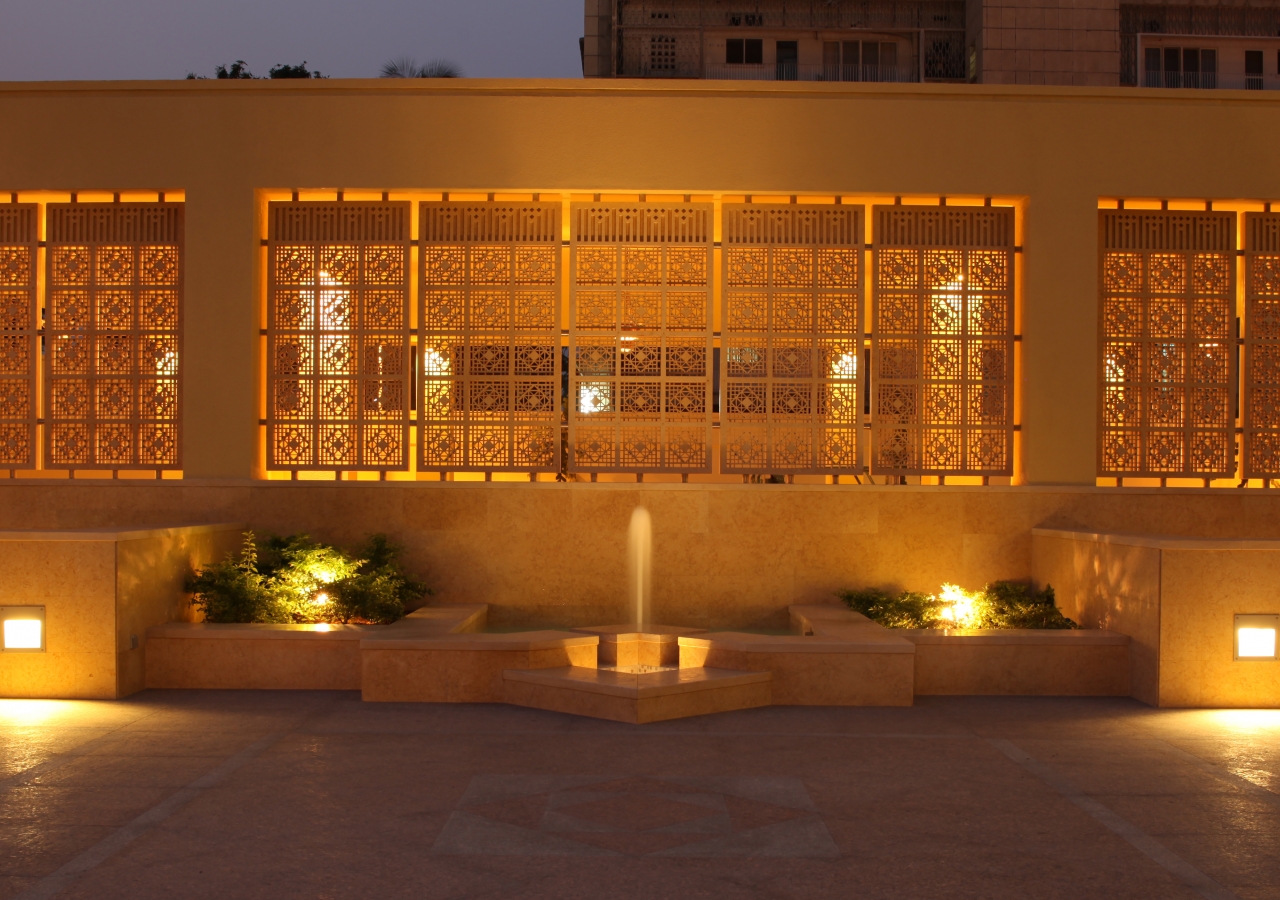 Enclosed by panels of limestone trellis, the Grand Courtyard of the Ismaili Jamatkhana and Centre, Kinshasa is a delight for the senses.