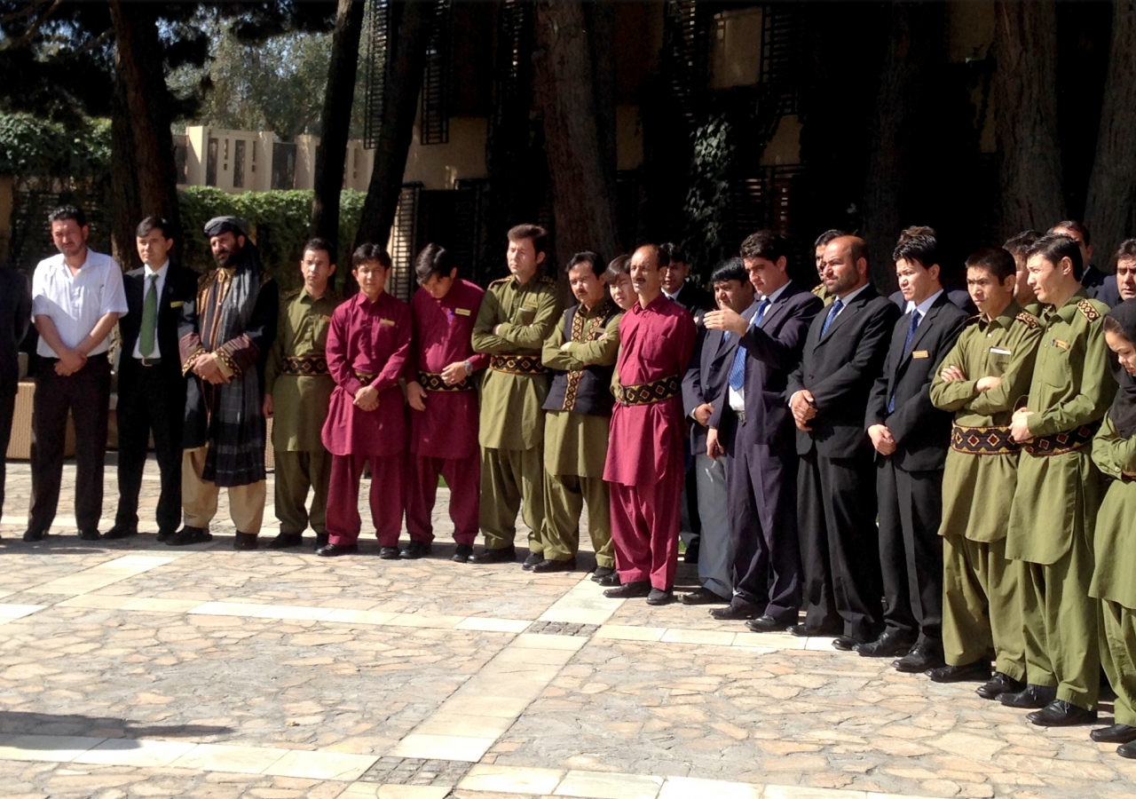 Participants in Afghanistan listen to a briefing on the AKDN ShakeOut earthquake drill.