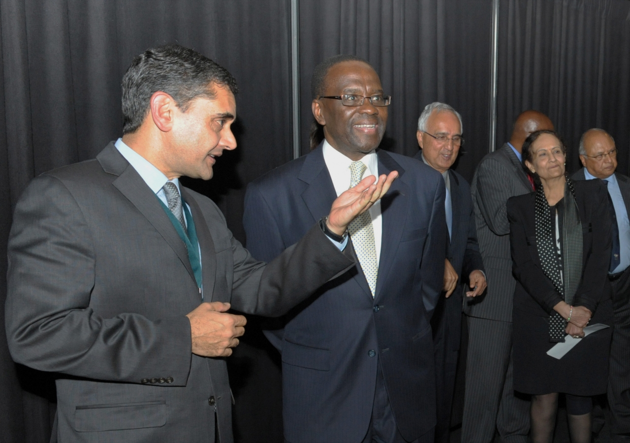 Chief Justice Dr Willy Mutunga and Ismaili Council for Kenya President Nawaaz Gulam share a light moment while touring the RAYS OF LIGHT exhibition, during an outreach event for the Judiciary of Kenya.