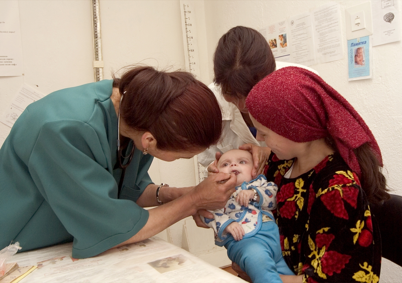 A mother brings her infant for a check-up at one of 18 facilities supported by the Aga Khan Health Services in Rushan, Tajikistan.