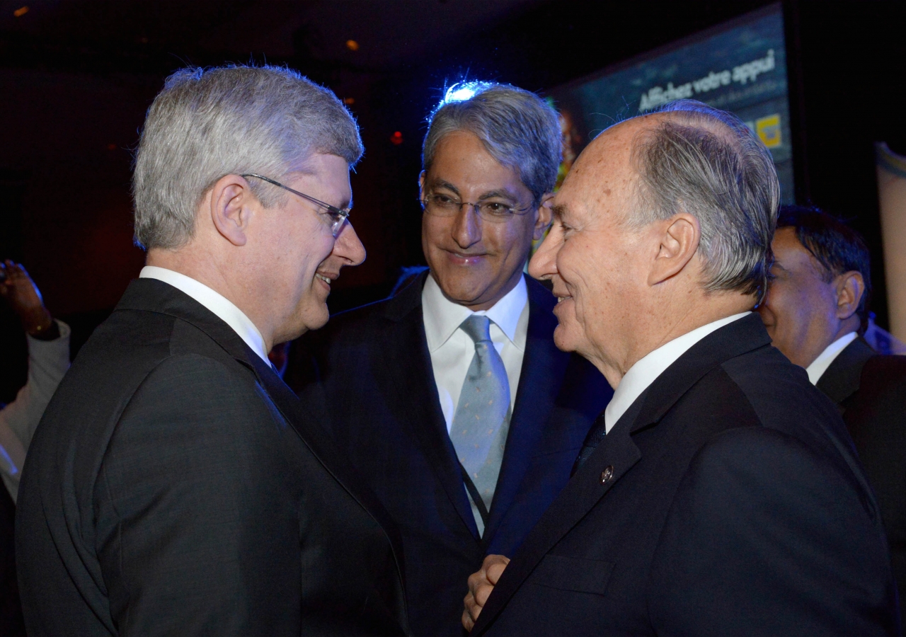 Mawlana Hazar Imam, Canadian Prime Minister Stephen Harper and Ismaili Council for Canada President Alijah Malik Talib share a moment together at the Maternal,Newborn and Child Health Summit in Toronto.