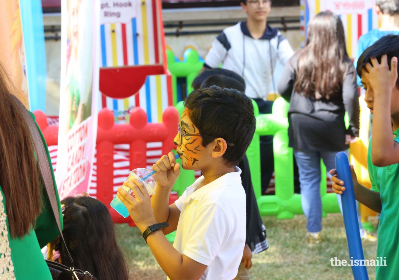 Face painting fun at the Mulaqat Mela