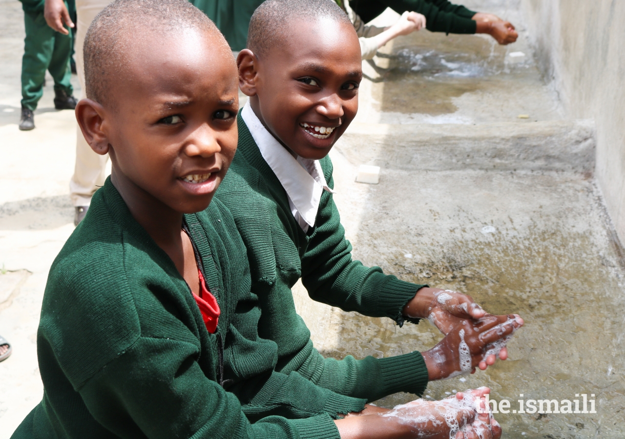 Children in Tanzania being educated on the proper use of handwashing with donations from                 the Eco-Soap Bank and Vijiti partnership.