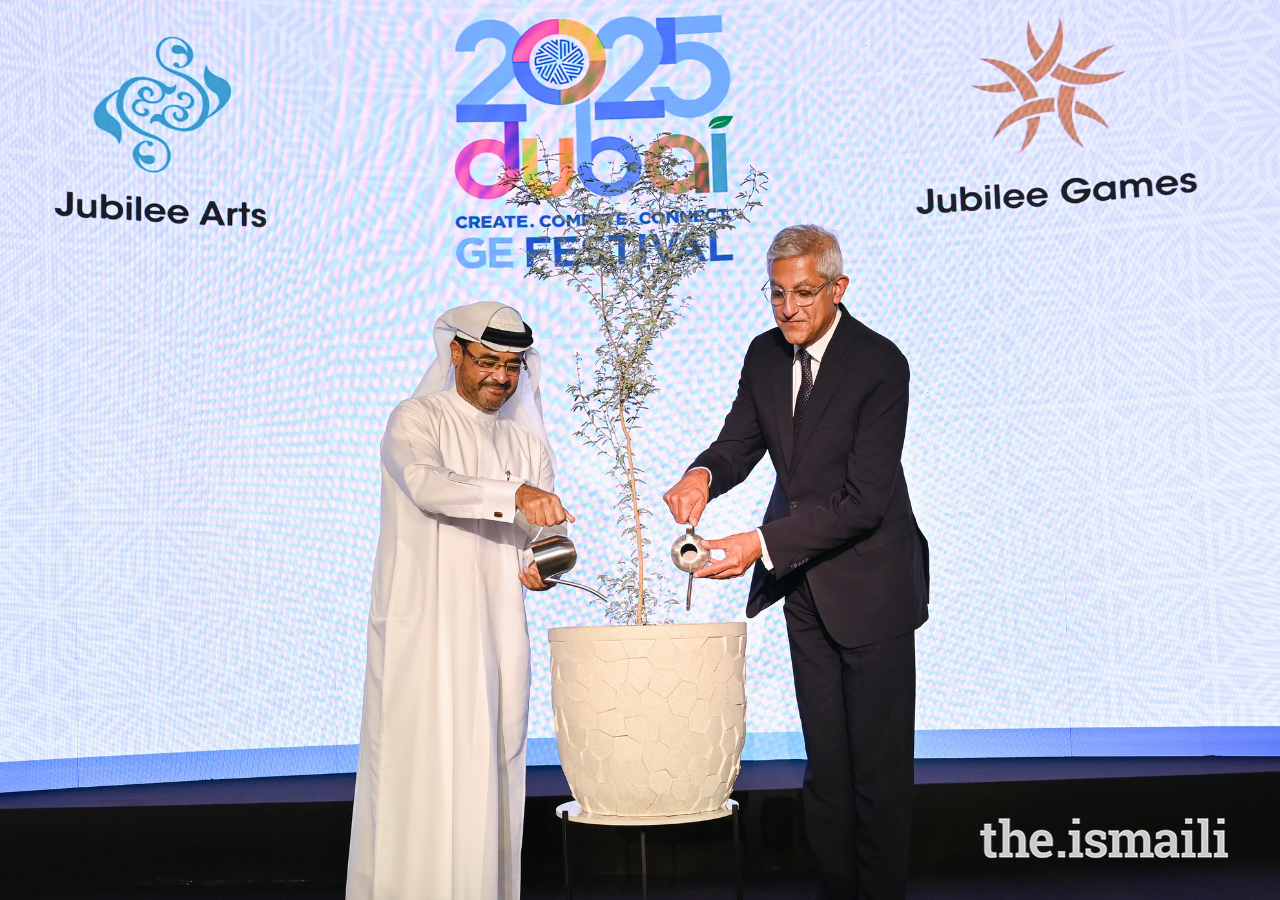 Malik Talib, Chairman of the Ismaili Leaders International Forum and Mr Mohammed Shael Al Saadi launch the “Roots for Change” campaign by watering a Ghaf tree sapling.