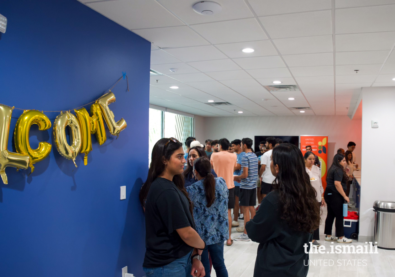 Students and parents mingle with members of the leadership at the Open House.