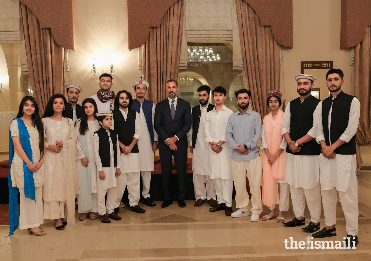 Prince Rahim joins performing artists for a group photograph.