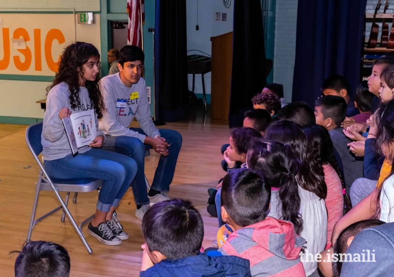 LAHQ REC Students reading the book, "Have You Filled Your Bucket Today?" to teach students at Brockton Elementary the importance of respecting their peers, while showing that reading can be fun.