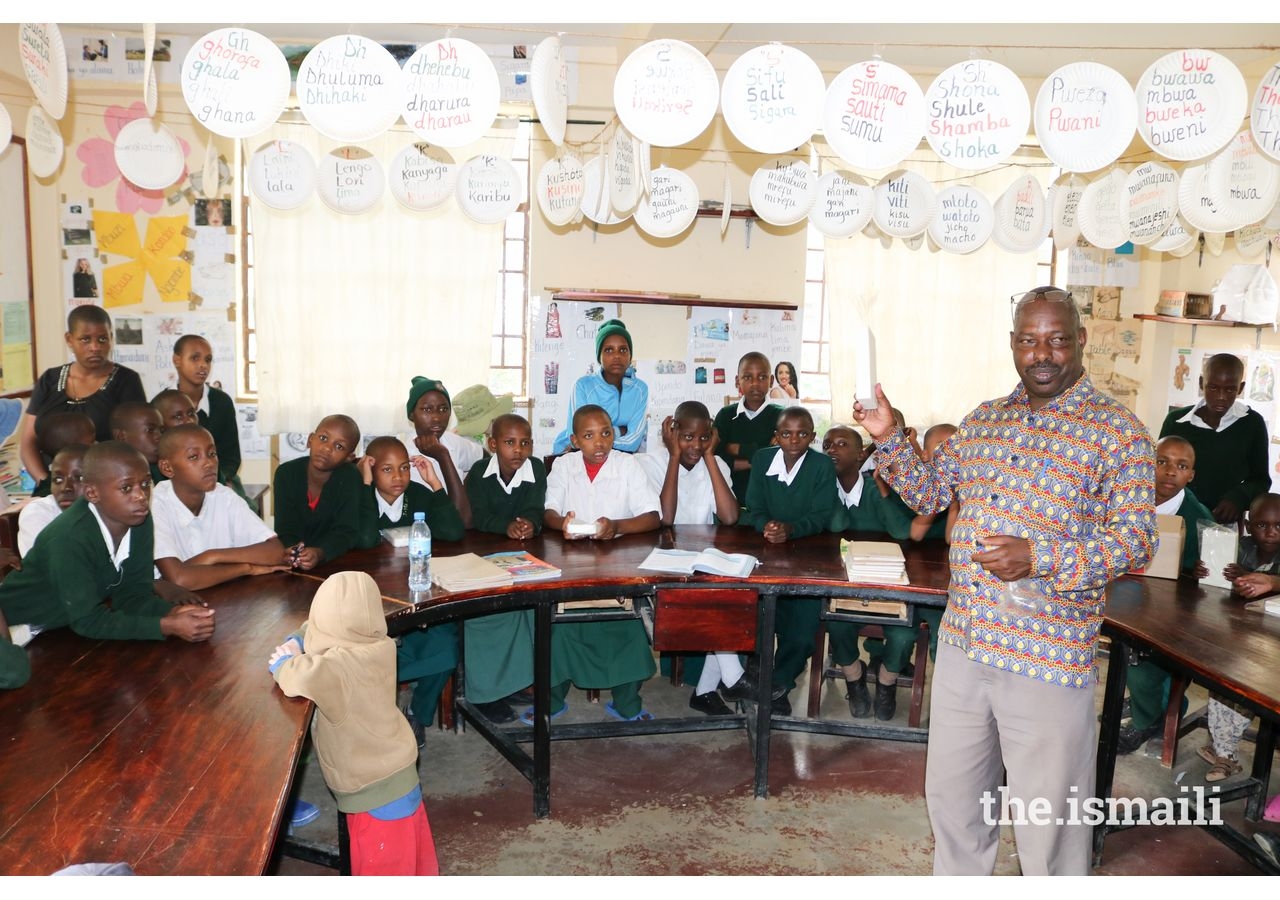 Vijiti and Eco-Soap Bank partner to educate. Here, a teacher in Tanzania addresses pupils on proper hygiene.