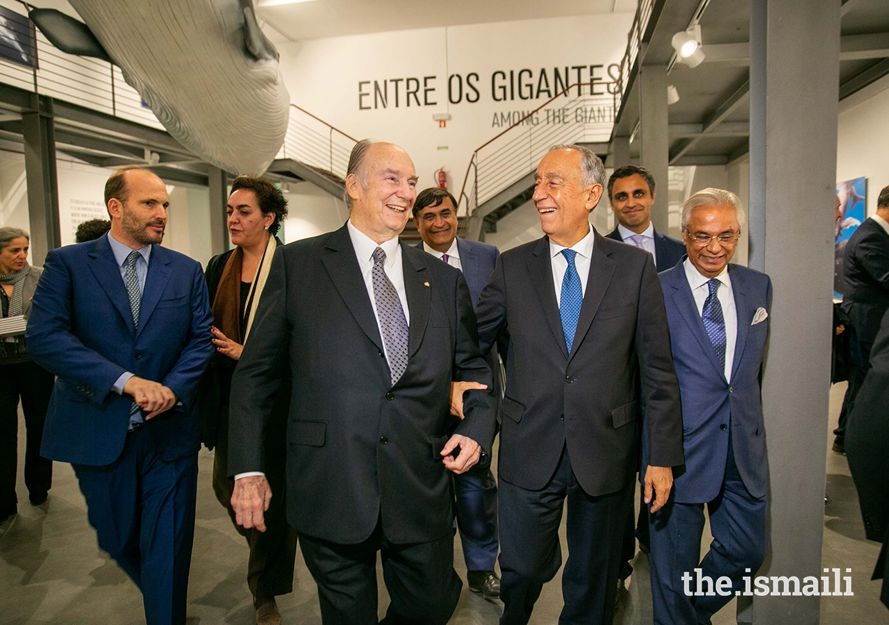 Mawlana Hazar Imam and President Marcelo Rebelo de Sousa share a light moment at The Living Sea photo exhibition in Lisbon.