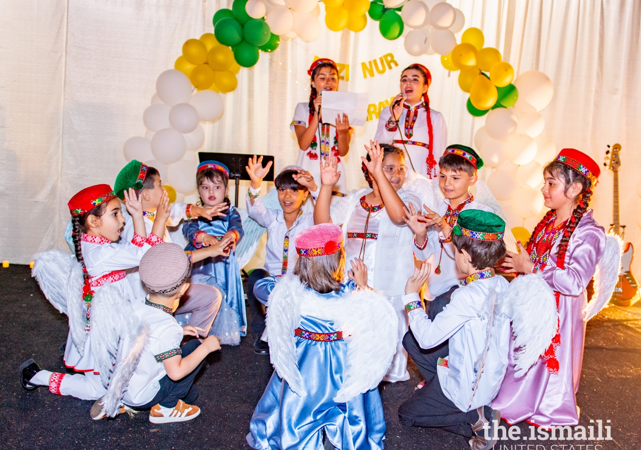 Children singing and dancing to share their talents with the Jamat.