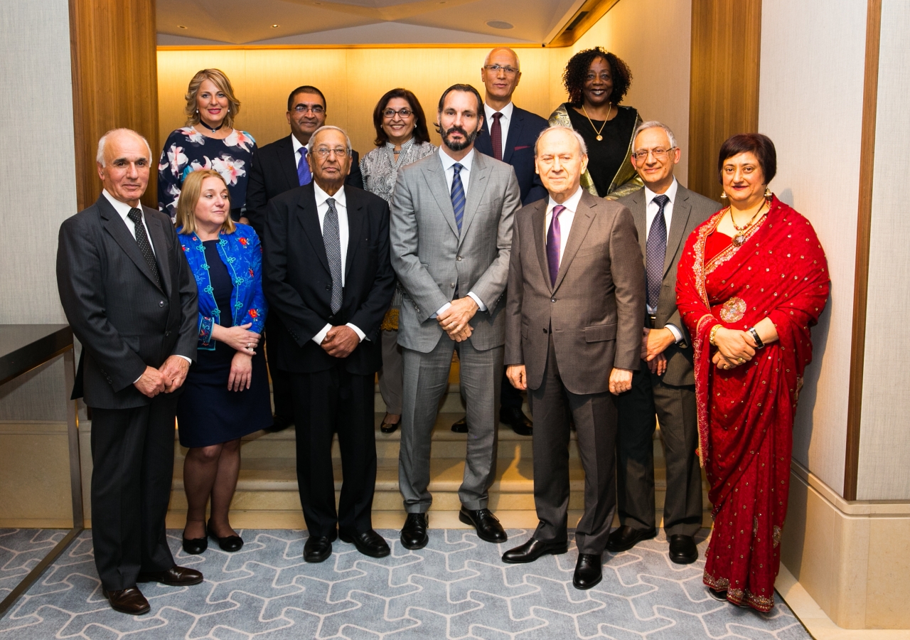 Prince Rahim joins members of staff recognised for their long-service at the IIS for a group photograph