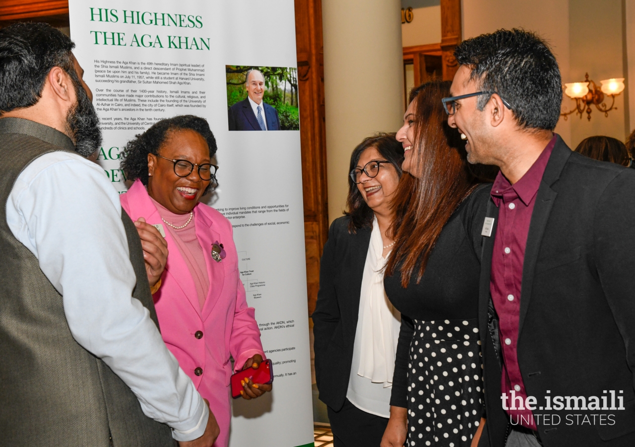 Georgia Representative Kim Schofield shares a light moment as she learns about the festival of Navroz and the Aga Khan Development Network.