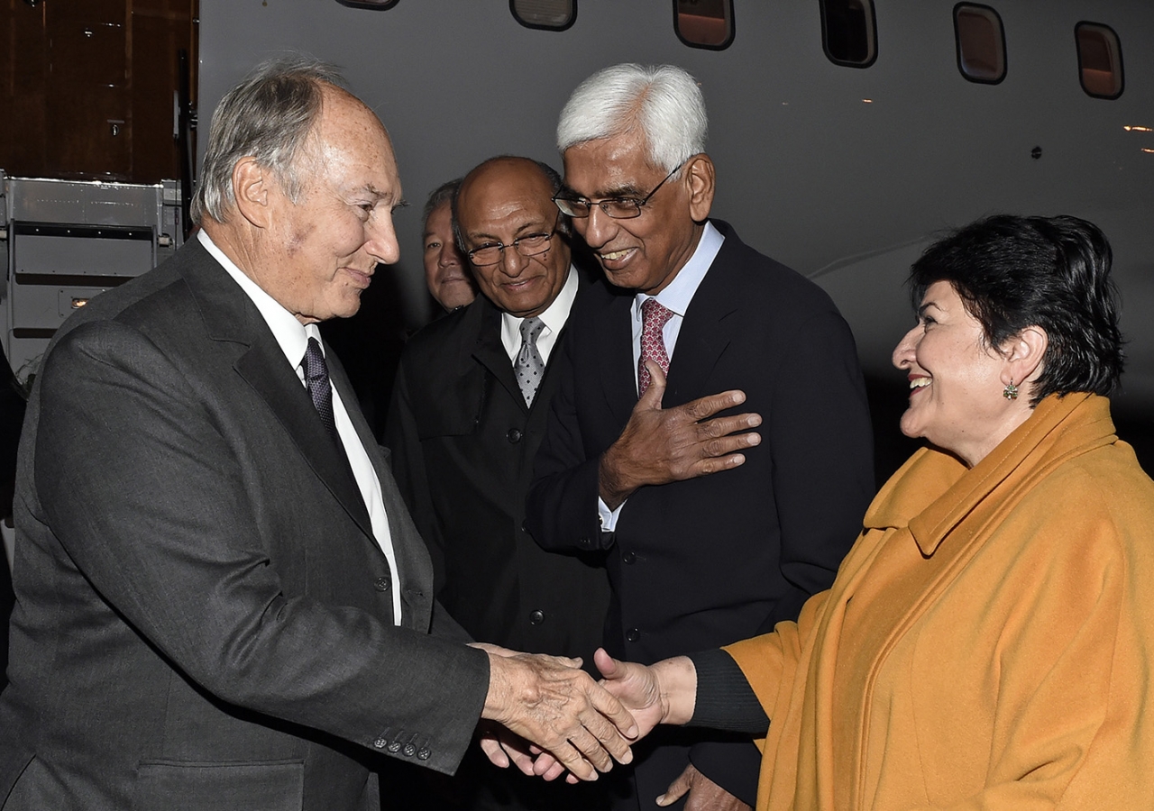 Mawlana Hazar Imam is welcomed to the Kyrgyz Republic by Ismaili Council President Sharofat Mamadambarova, and AKDN Representatives for Tajikistan and Kyrgystan, Akbar Pesnani and Shamsh Kassim-Lakha, respectively. AKDN / Gary Otte