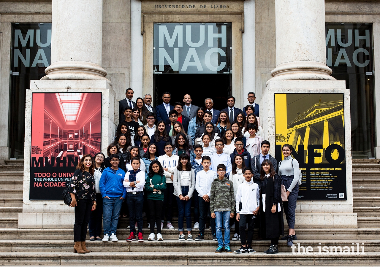 Prince Hussain poses for a group photograph with secondary students from the Lisbon Jamat’s Talim (religious education) classes, at the National Museum of Natural History and Science in Lisbon.