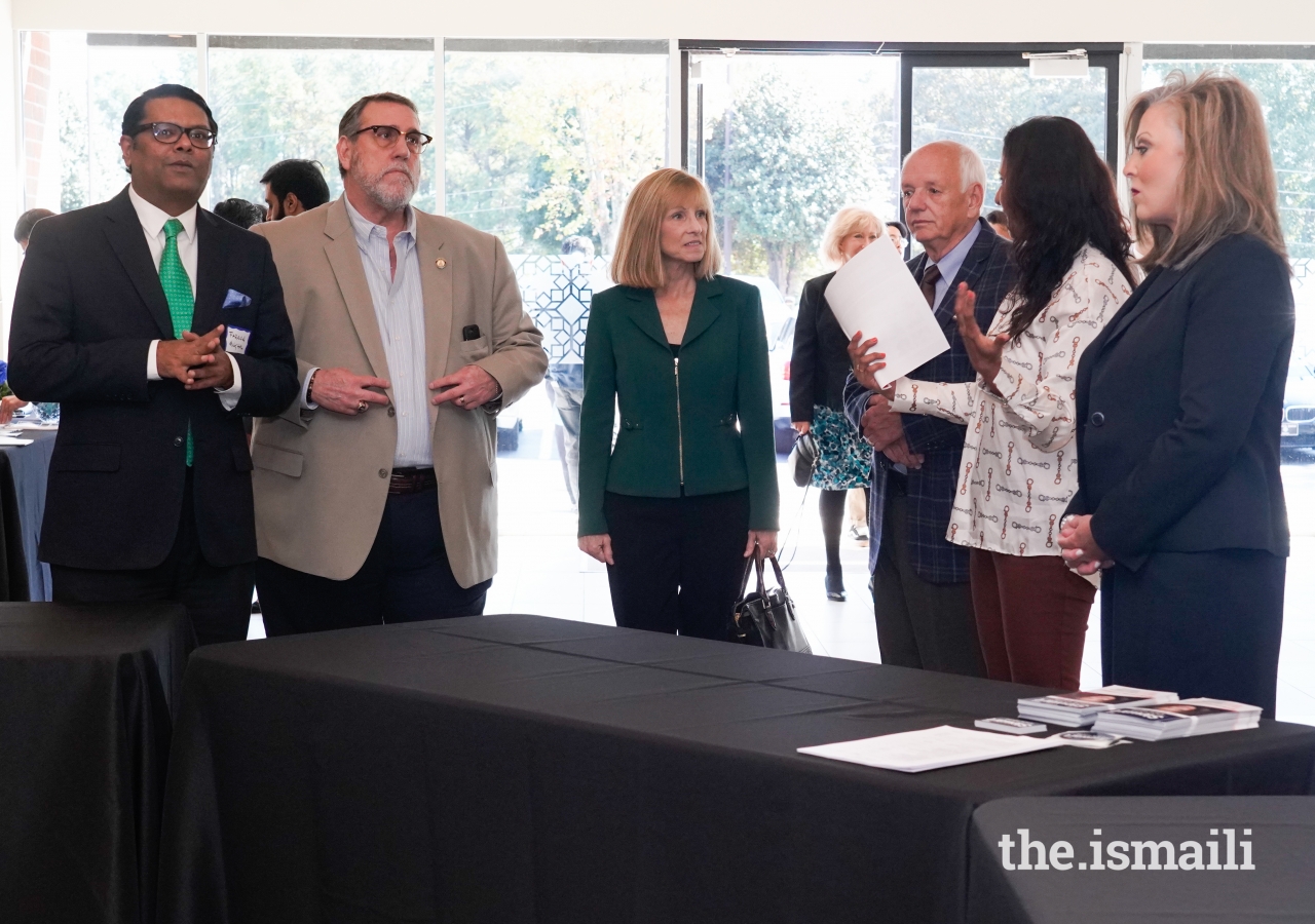 Representative Pedro Marin, State Revenue Commissioner Lynne Riley, Representative Kelly Stewart and others attend the Nonpartisan Candidate Forum hosted at the Ismaili Jamatkhana.