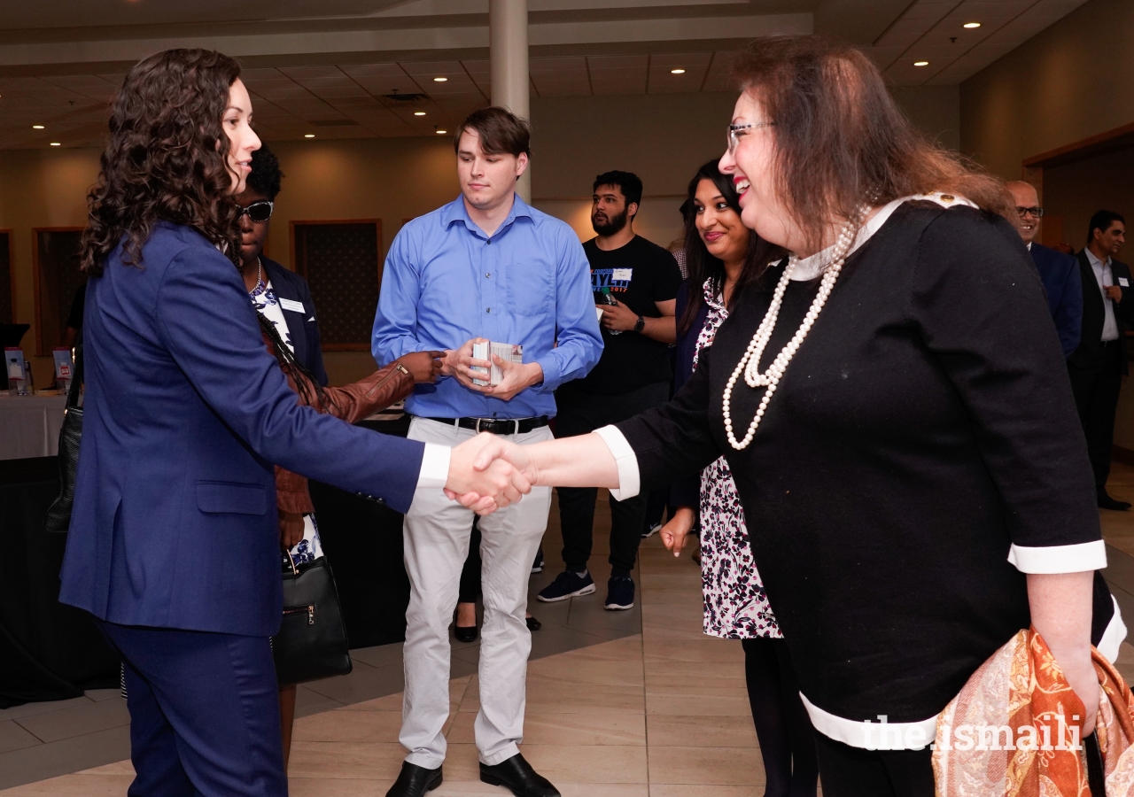 Gwinnett Commissioner Lynette Howard and Candidate Beth Moore connect at the Nonpartisan Candidate Forum that brought together civic leaders and sixteen candidates from both sides of the aisle at the Ismaili Jamatkhana for an inclusive dialogue and learning.