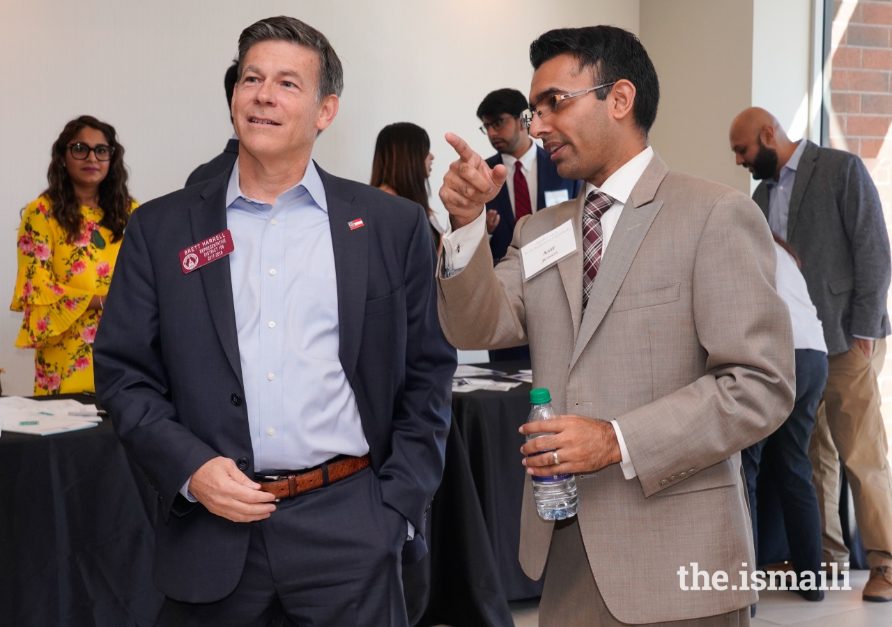 Asif Jessani and Representative Bret Harrell enjoy networking during the Candidate Forum.