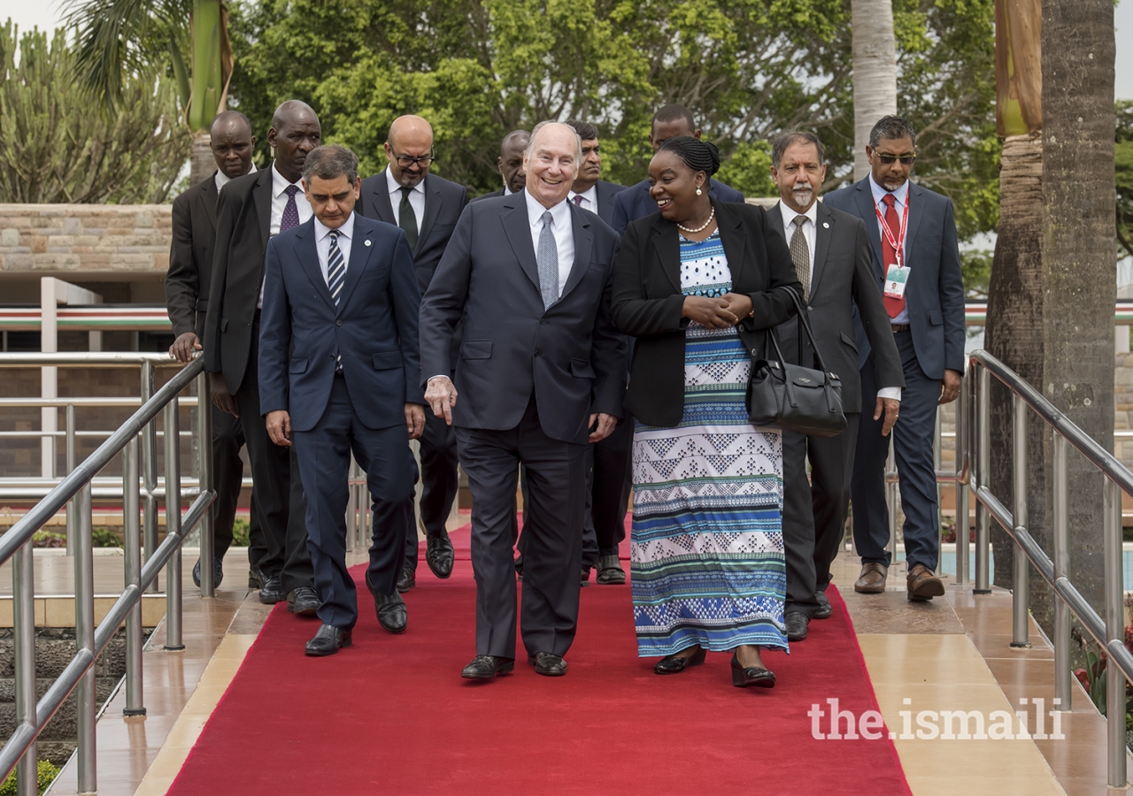 Mawlana Hazar Imam in conversation with Ambassador Monica Juma, Cabinet Secretary for Foreign Affairs and International Trade, at Jomo Kenyatta International Airport, Nairobi.