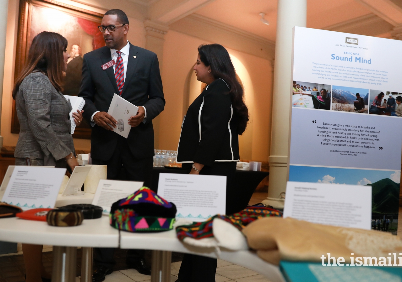 Representative Vernon Jones learns more about the Ethics in Action exhibition.