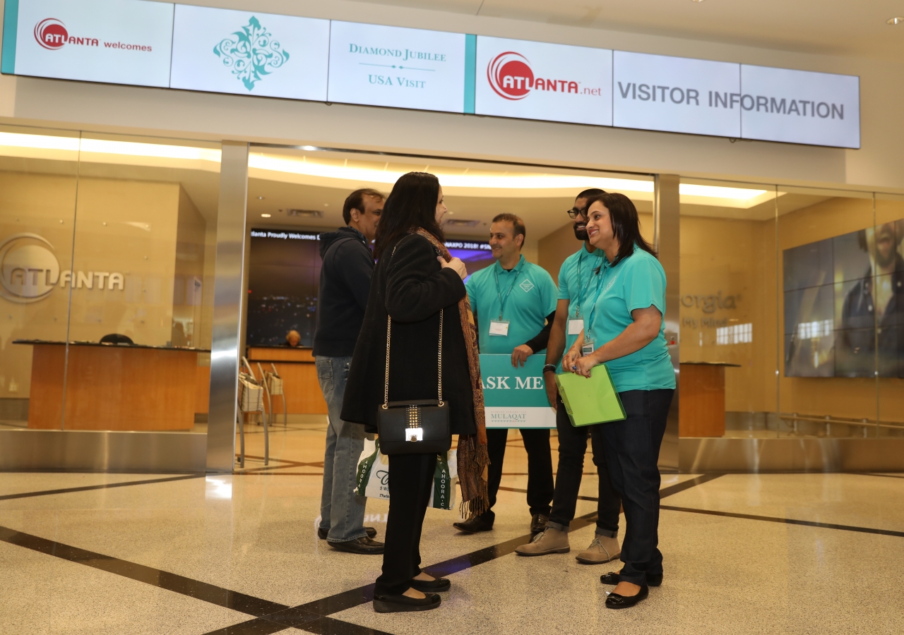 Volunteers greet the Jamat around around the country at Atlanta airport.