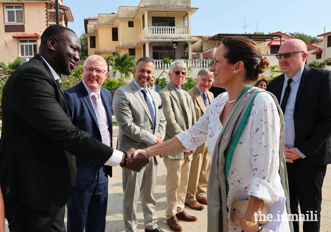 Princess Zahra greets Bruce Iningu, head of facilities at the Aga Khan Academy, Mombasa.