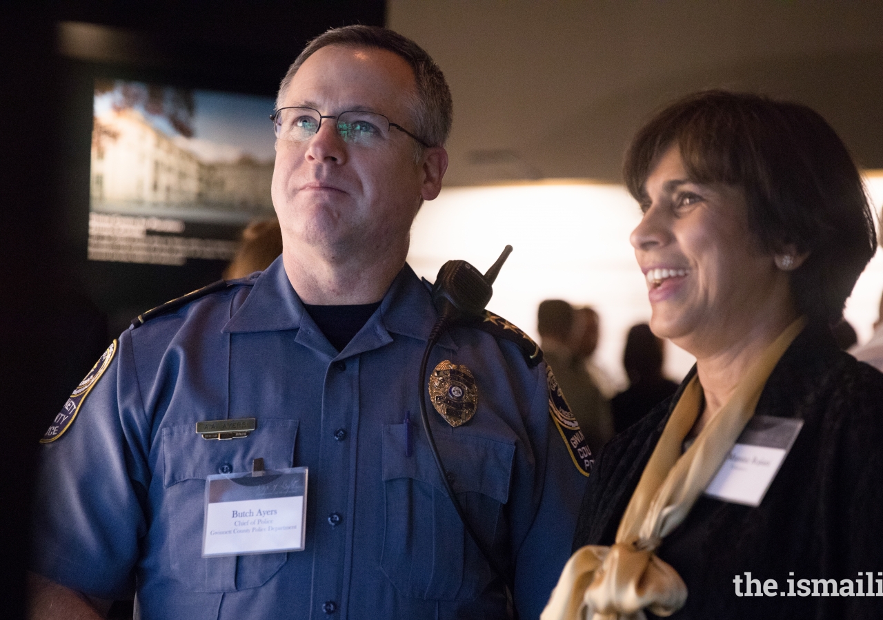 Mumtaz Rojiani gives a tour to Gwinnett County Police Chief, Butch Ayers.